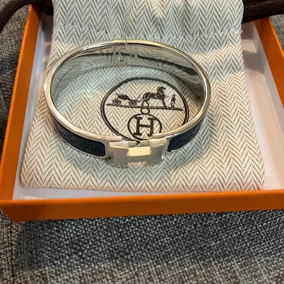 Brand new Click H Hermes bracelet (still has plastic wrapping on it) in box. - Picture 1 of 4